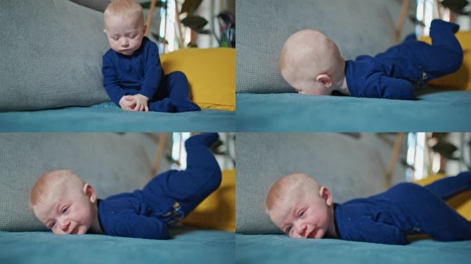 可爱的小男孩穿着蓝色天鹅绒紧身衣倒在家里的沙发上