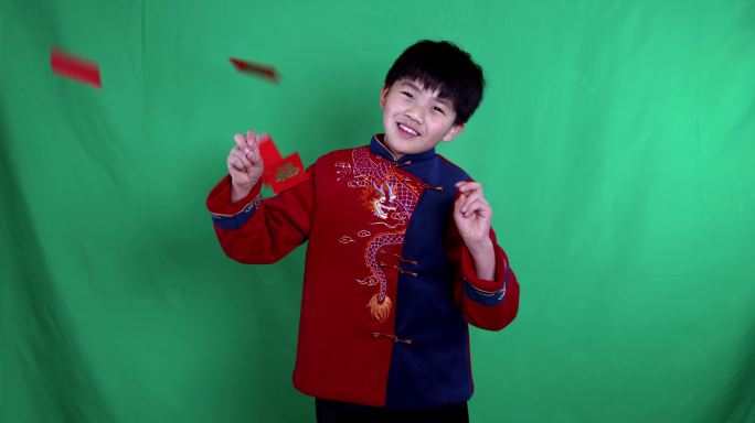 中国小男孩恭贺新年撒红包慢镜绿幕抠像