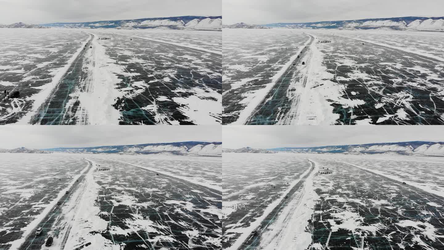 汽车行驶在贝加尔湖的冰面上。