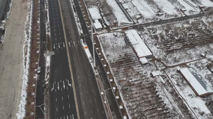 航拍城市雪景石家庄建筑街道交通