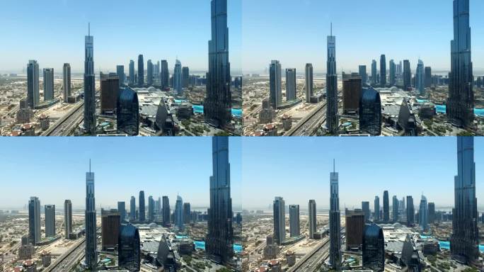 阿拉伯联合酋长国迪拜- 2023年5月28日:阿联酋迪拜城市现代商业区全景鸟瞰图。蓝天下的哈利法塔的