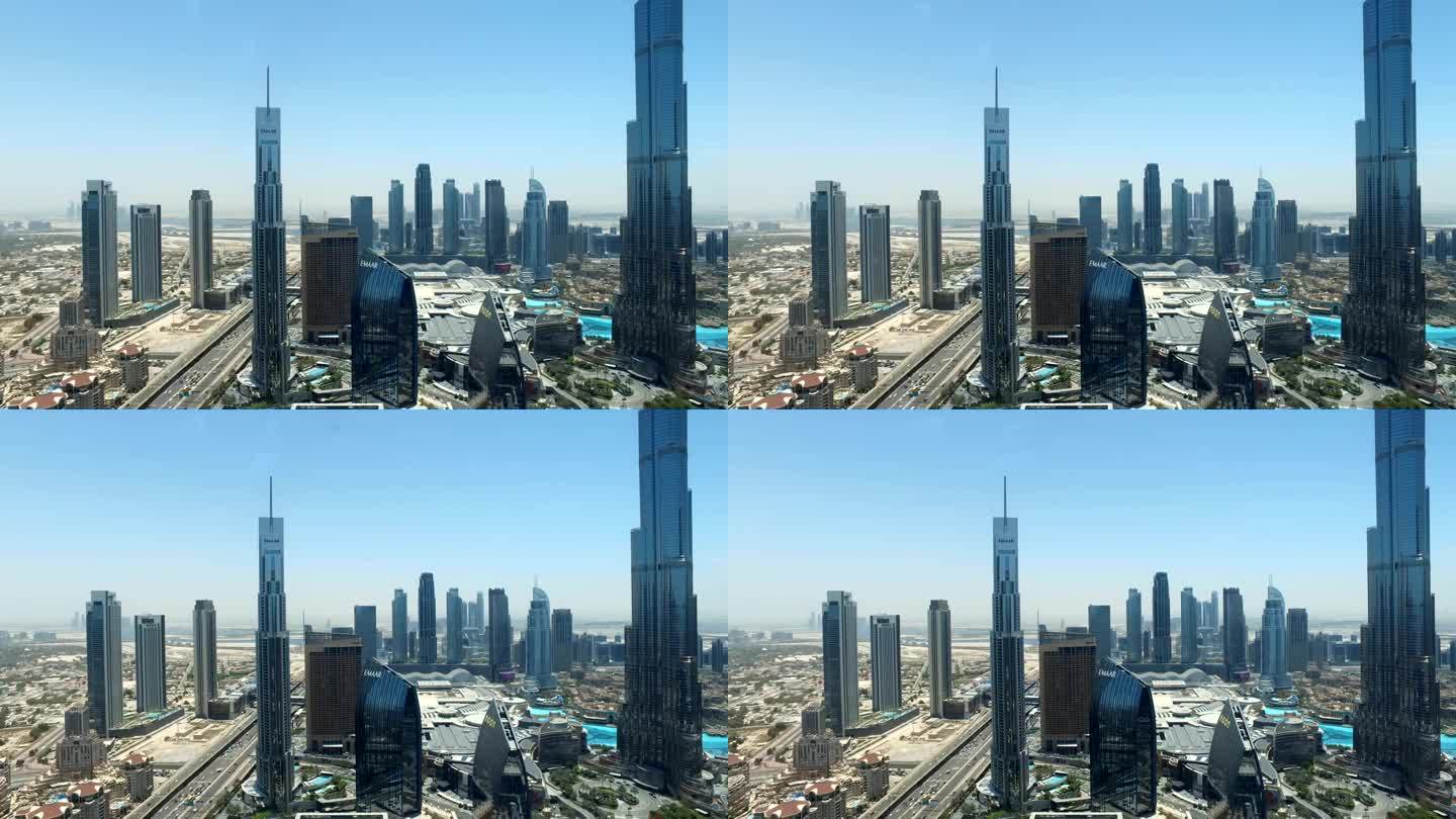 阿拉伯联合酋长国迪拜- 2023年5月28日:阿联酋迪拜城市现代商业区全景鸟瞰图。蓝天下的哈利法塔的