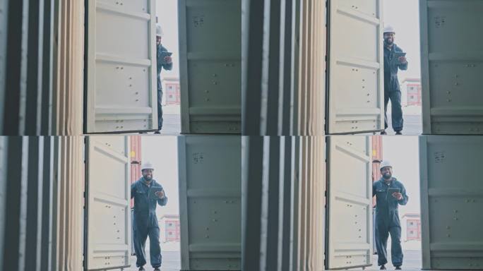 非裔美国工程师工人在集装箱码头打开集装箱