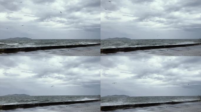在风雨交加的日子里，海浪冲击着海岸和风