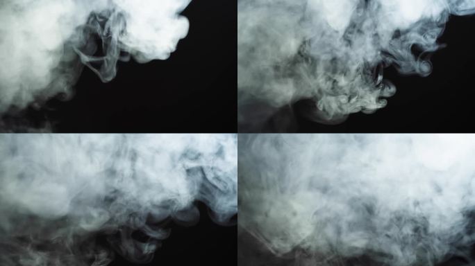 在黑色度键背景上抽象烟雾。在黑暗中吸烟，蒸汽云特写。