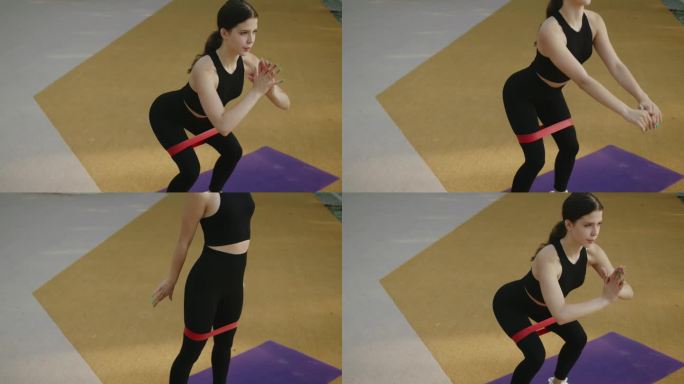 运动女性在运动垫上用松紧带进行锻炼和下蹲