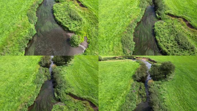 从空中看，英国沃里克郡郁郁葱葱的绿色乡村和蜿蜒的Arrow河。