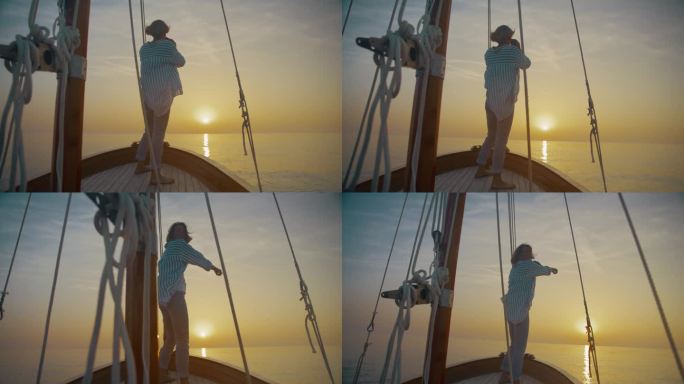 一个女人正在用双筒望远镜欣赏海上地平线上的日落