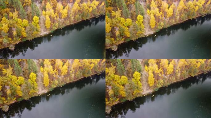 秋天的空中河上有皮艇和生机勃勃的森林