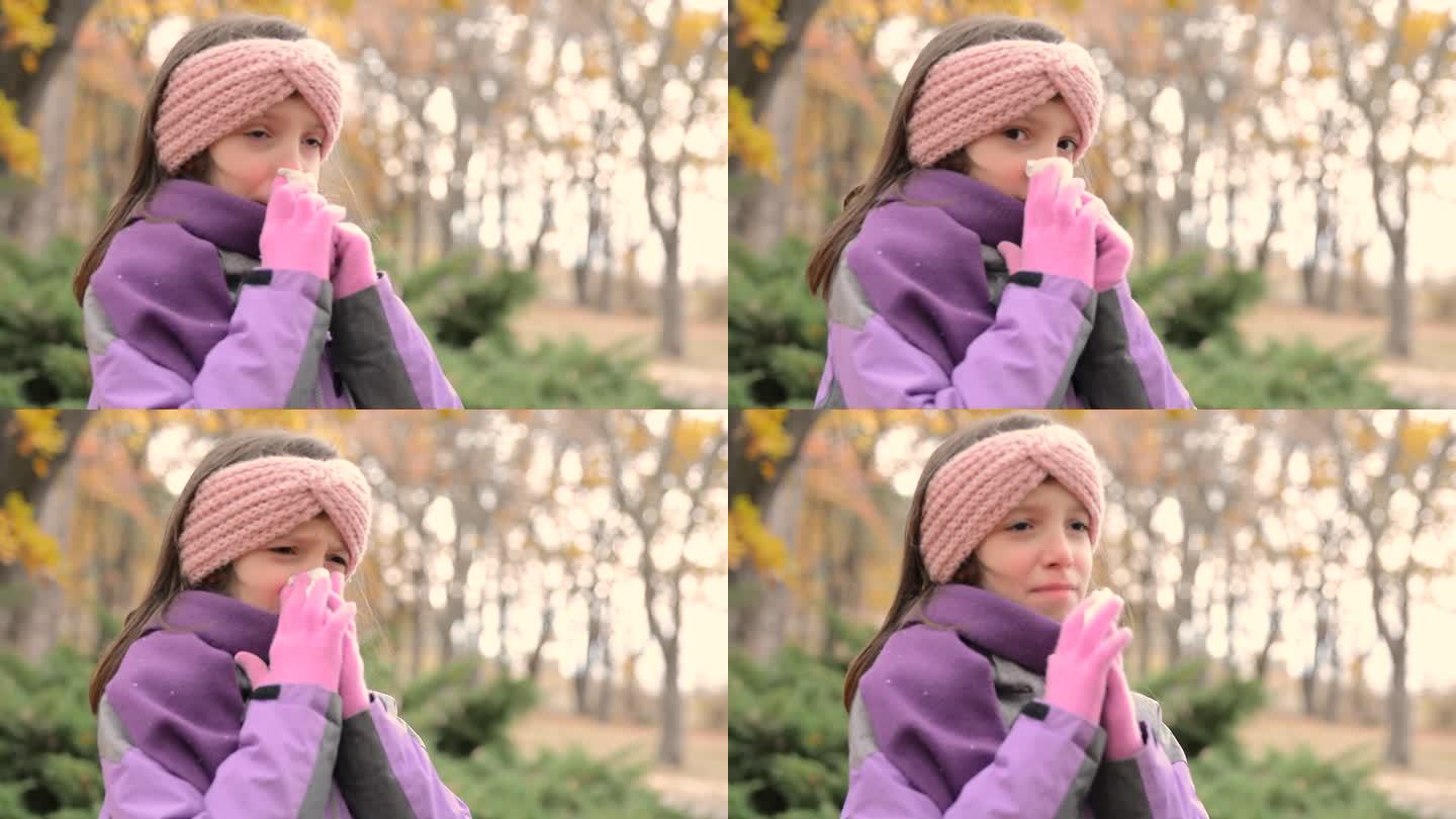 冬日里，一个女孩在公园里擤鼻涕