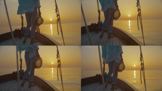 一个女人在欣赏海上地平线上的日落