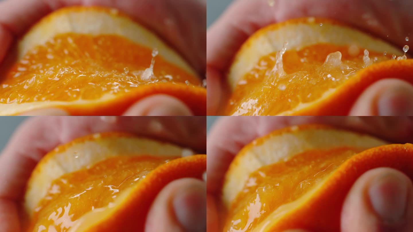橙子被挤压时爆裂的特写