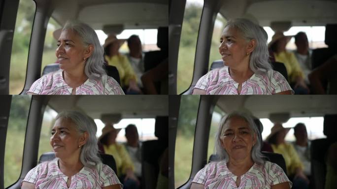 一位年长的女游客在一辆面包车里的肖像