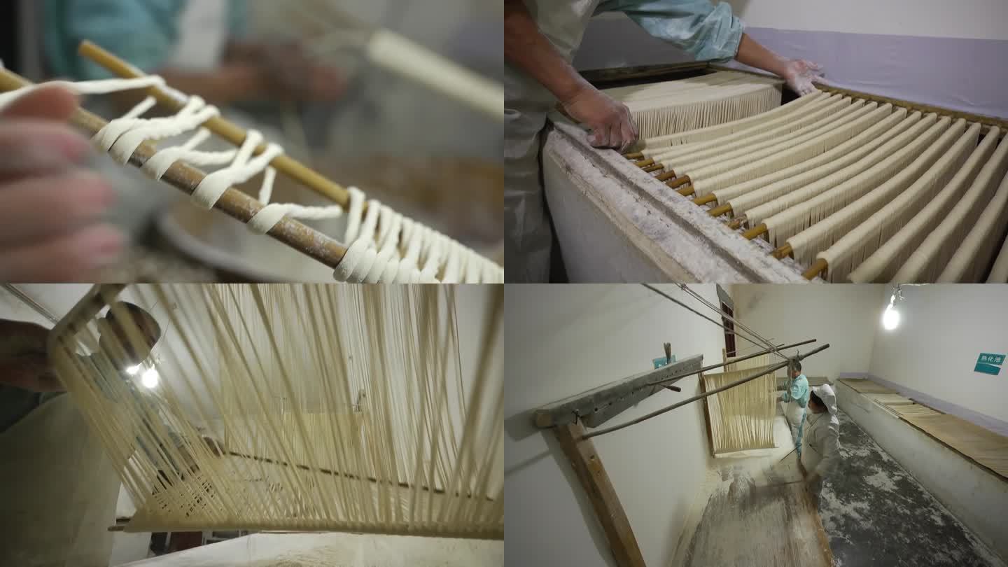 把制作好的传统手工挂面缠在竹竿上
