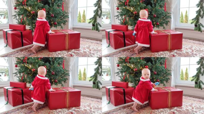 在一个明亮的大房间里，一个穿着红色新年礼服的漂亮小女孩站在圣诞树下，旁边是一个大礼物。这个女孩跳舞时