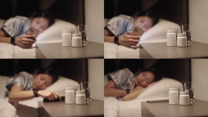 睡觉前玩手机的女人