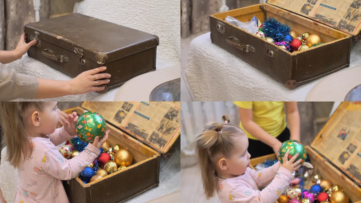一位妇女打开一个装有新年玩具的旧箱子，孩子们热情地向它跑去。孩子们兴高采烈地看着箱子里的新年玩具。圣