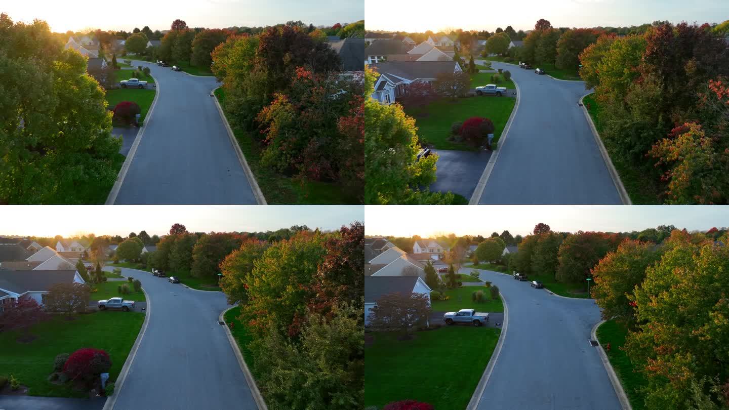 在秋天傍晚的黄金时段，美国附近。房屋和住宅的航拍照片。