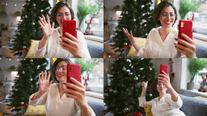 在视频通话中，一名兴奋的年轻白人女子展示了她的圣诞树