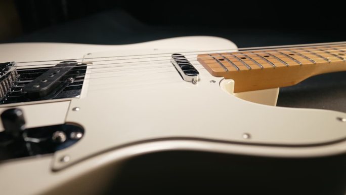 白色传奇电吉他设计。音乐背景。极宏滑块