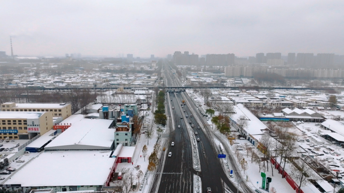 城市开发区下雪航拍