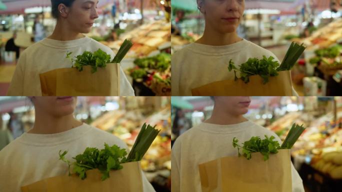 年轻女子在食品市场、蔬菜配送、网店购物。在超市买西红柿、黄瓜、辣椒、花椰菜，新鲜蔬菜，袋装商品，素食