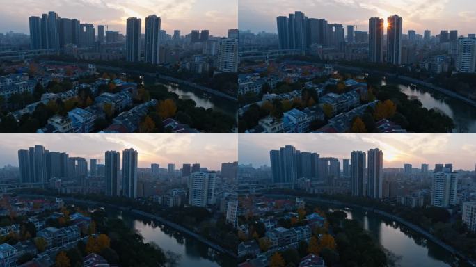 深秋夕阳下航拍成都河滨别墅区金黄银杏美景