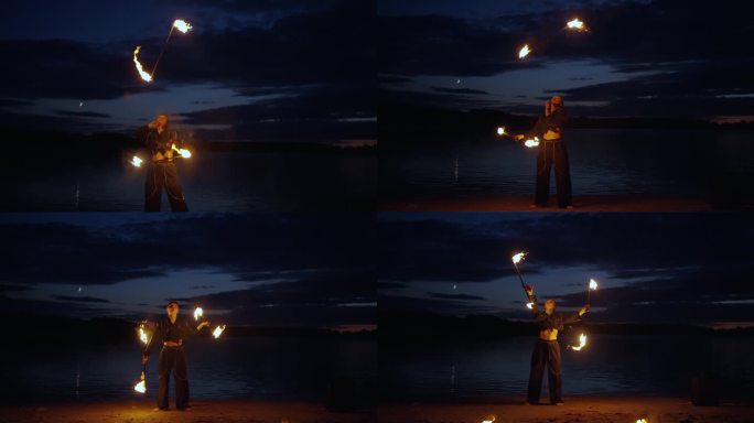 专业的特技演员在夜间用火表演，手持火炬的女士剪影