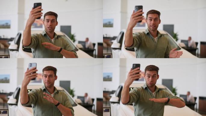 汽车经销商在网上发布了一幅快乐的男视频博主的中景照片，他正在评论新款自动驾驶智能手机。友好男子视频的