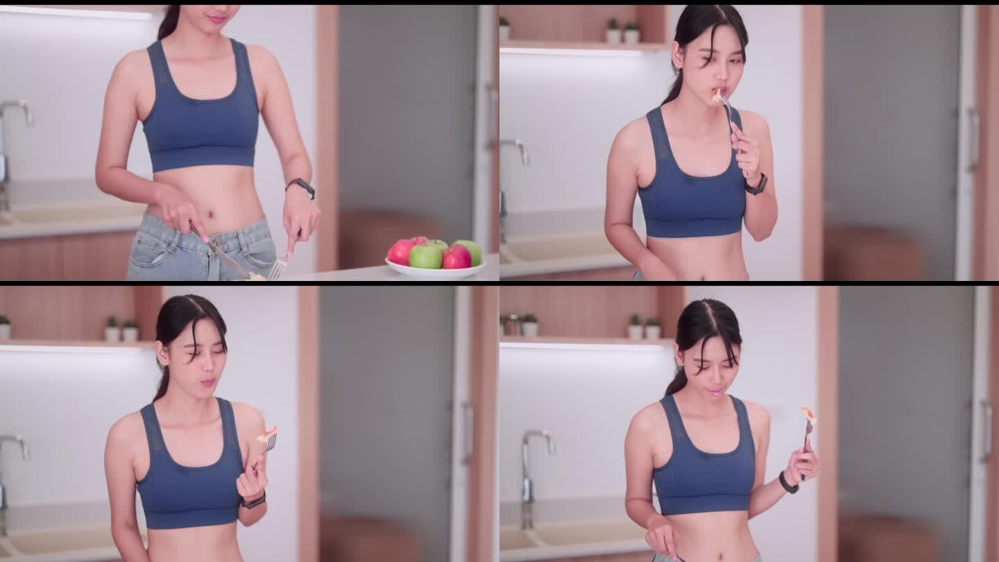 一位身着运动服的亚洲女运动员在厨房里享受着一块面包，她采用了一种平衡的体重管理方法。为了可持续的生活