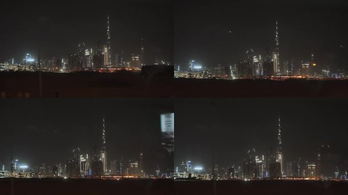 迪拜的夜景。黑暗中明亮的建筑物
