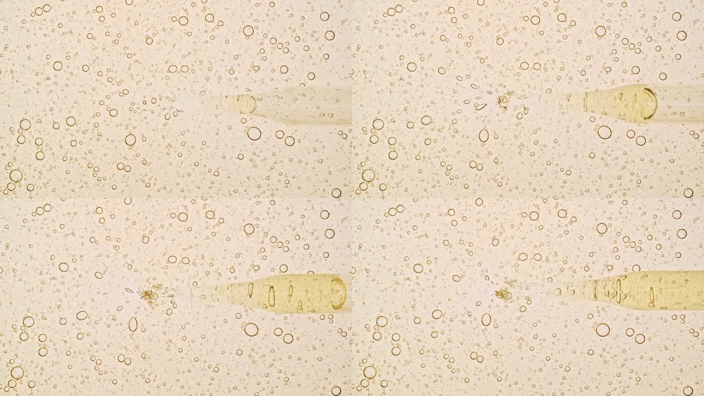 透明流体油，血清，凝胶从移液器到培养皿。化学实验室研究。天然有机化妆品，医药。生产天然化妆品特写。4