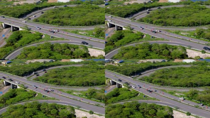 工人更换高速公路金属护栏的广角航拍图