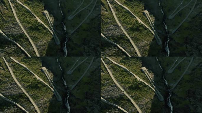 巨魔路径山蛇形道路在野生斯堪的纳维亚景观。