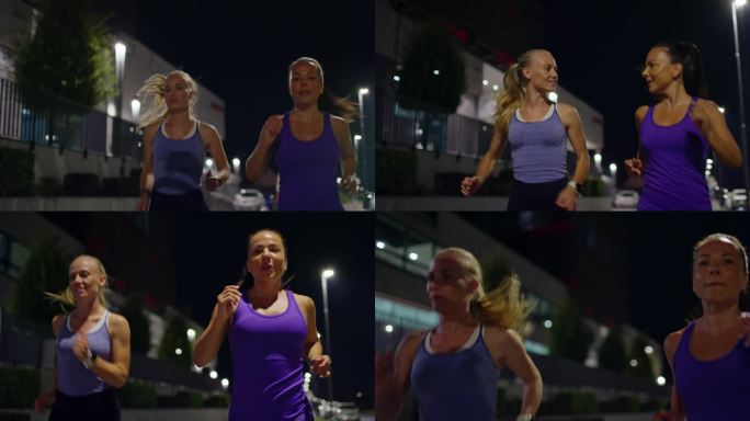 两个白人女人晚上在城里跑步