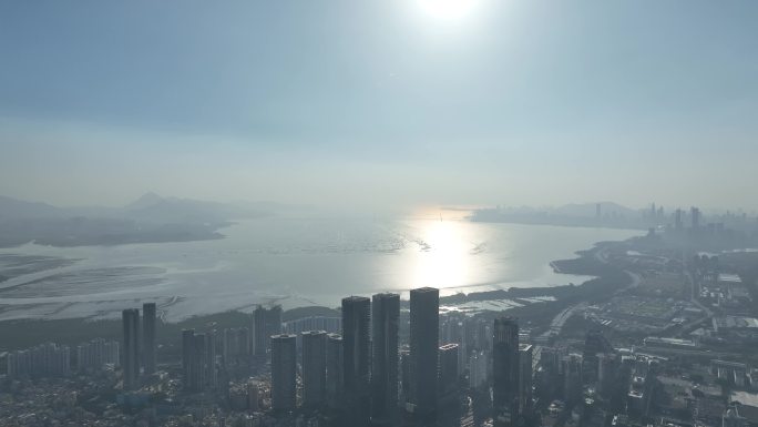 深圳湾夕阳日落航拍逆光城市福田区建筑阳光