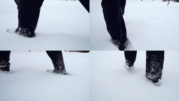 男人雪中行走的脚步特写镜头