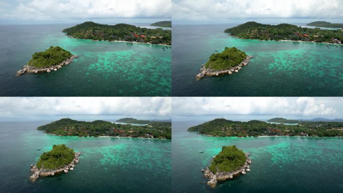 利佩岛，泰国沙敦，有珊瑚礁和多云的天空-绿松石海水与珊瑚礁-空中