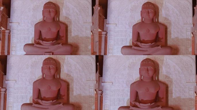 从不同的角度冥想耆那神神圣雕像的分离红石