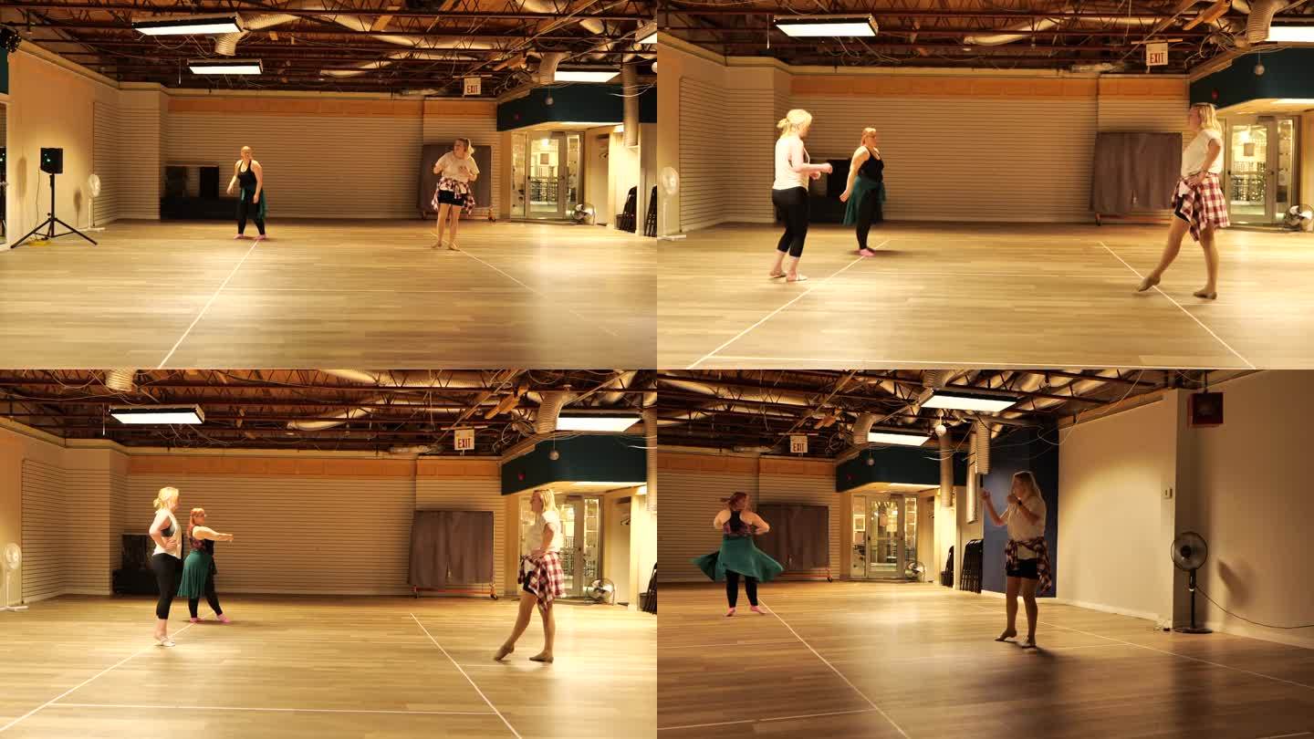 舞蹈室里练习舞蹈的老师和学生