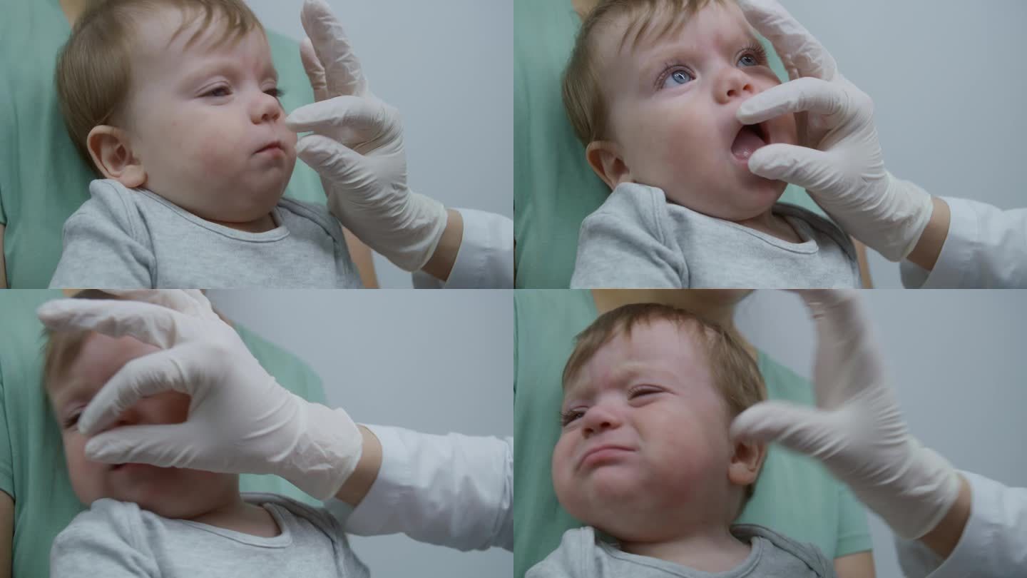 在明亮的医院病房里，医生试图检查小男孩的牙齿