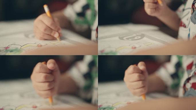 在家上学的艺术时刻:亚洲男孩用彩色铅笔画手的特写——家庭作业、爱好和创造性学习。