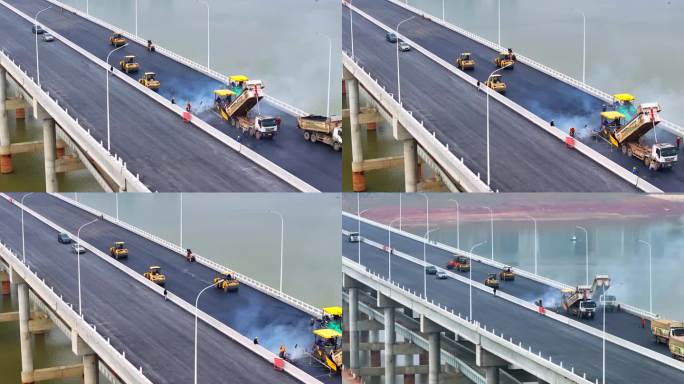 正在桥面施工建设的城市跨江大桥