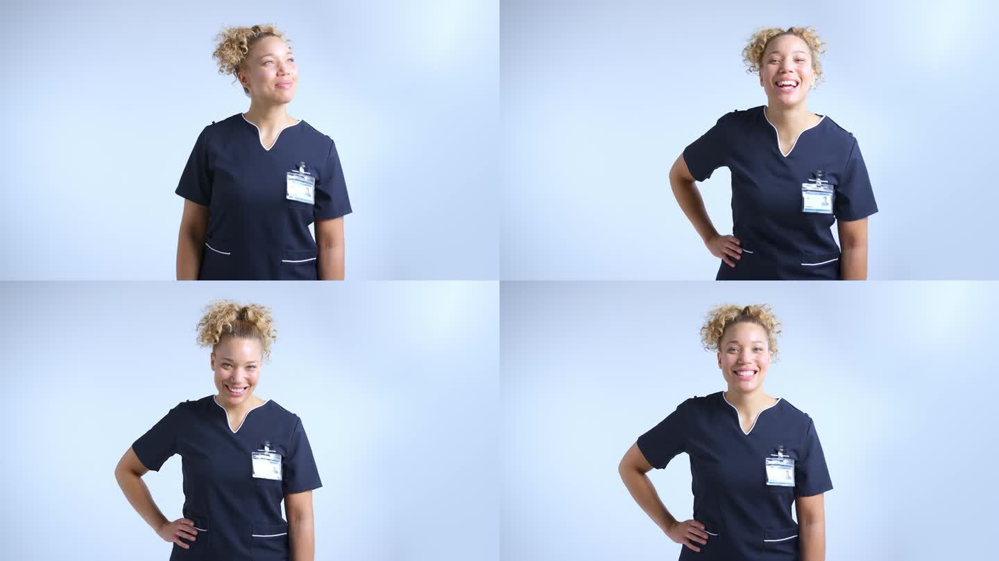 工作室肖像微笑女护士穿着制服灰色背景