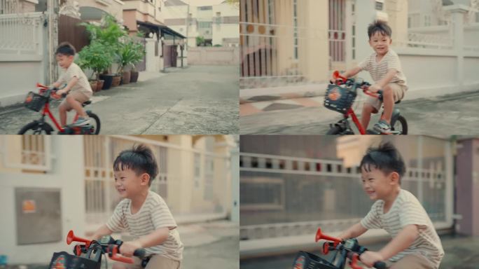 有趣的城市冒险:微笑的亚洲孩子在一个阳光明媚的日子里骑着一辆小自行车。