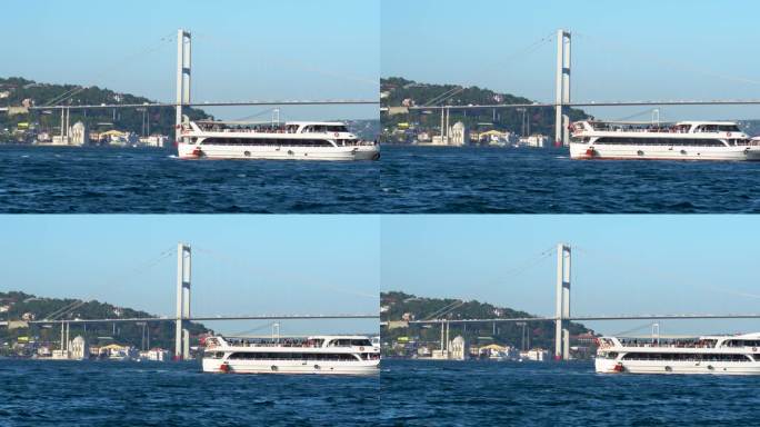 土耳其伊斯坦布尔，博斯普鲁斯海峡上的渡轮交通，背景是两座桥梁