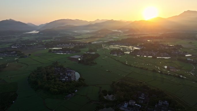 中国侨乡广东台山乡村稻田山脉山峰日出航拍