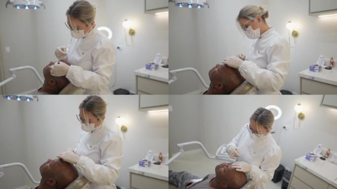 美容师在诊所给成年男性病人注射肉毒杆菌