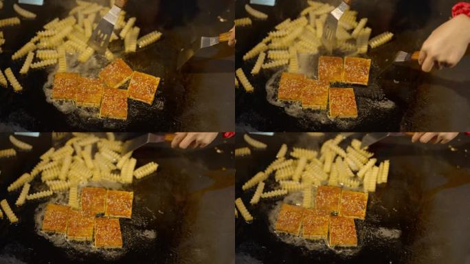 夜市食物合集美食城特写煎豆腐油炸制作
