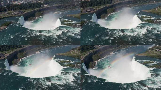 尼亚加拉马蹄瀑布航拍，巨大的水流从瀑布流下，水雾上有彩虹